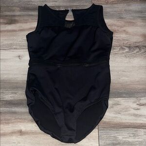 Girls Black Sleeveless Bodysuit size 9/10 with mesh middle design